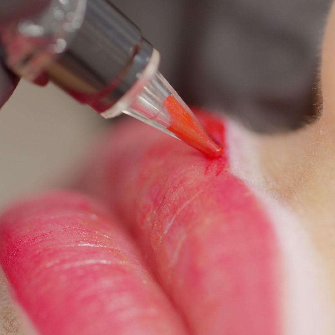 lips applying permanent makeup